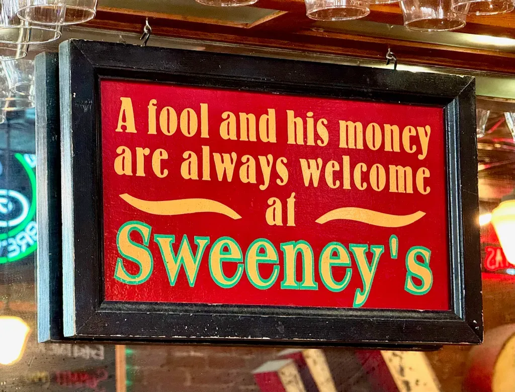 Vintage Sweeney's Saloon neon sign